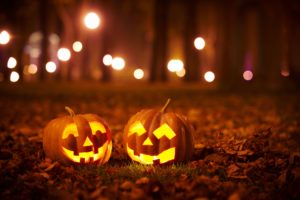 Two smiling carved pumpkins