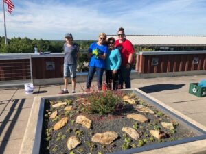 Extension Master Gardeners at the DOT Rooftop Garden.