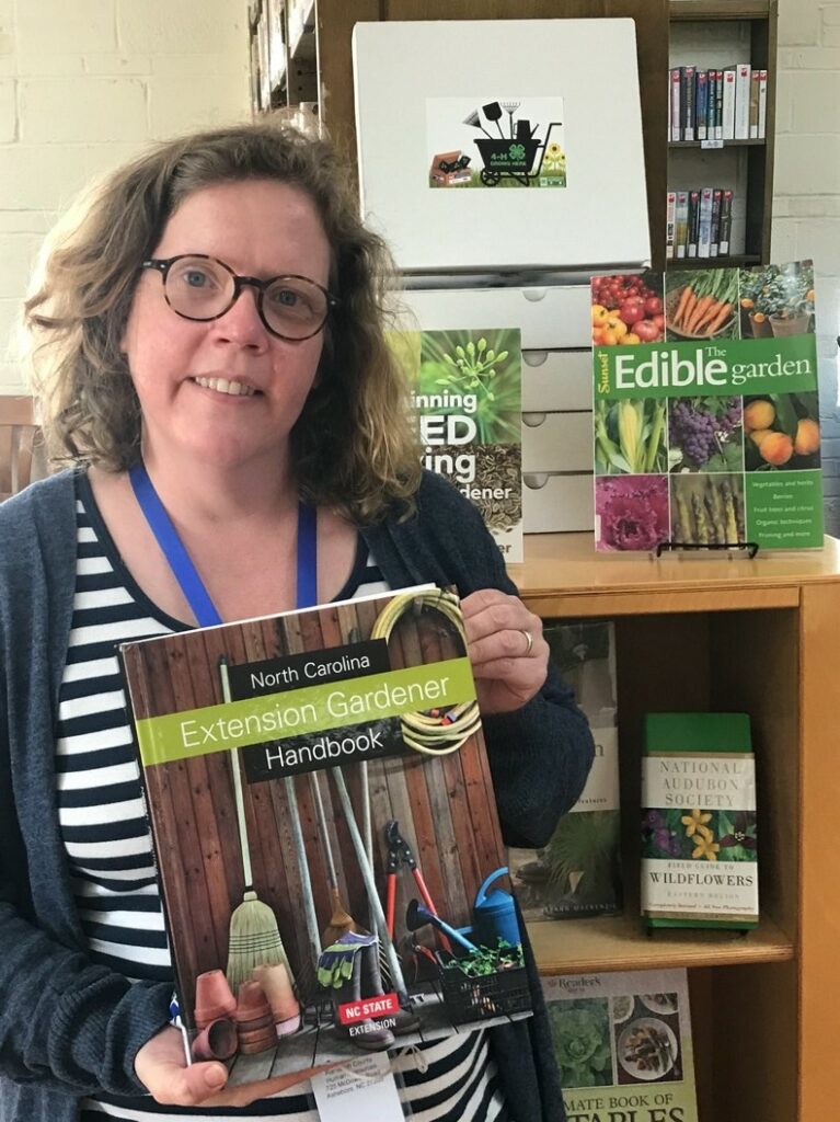 Librarian holding book