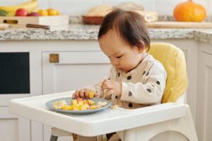 Toddler eating finger foods