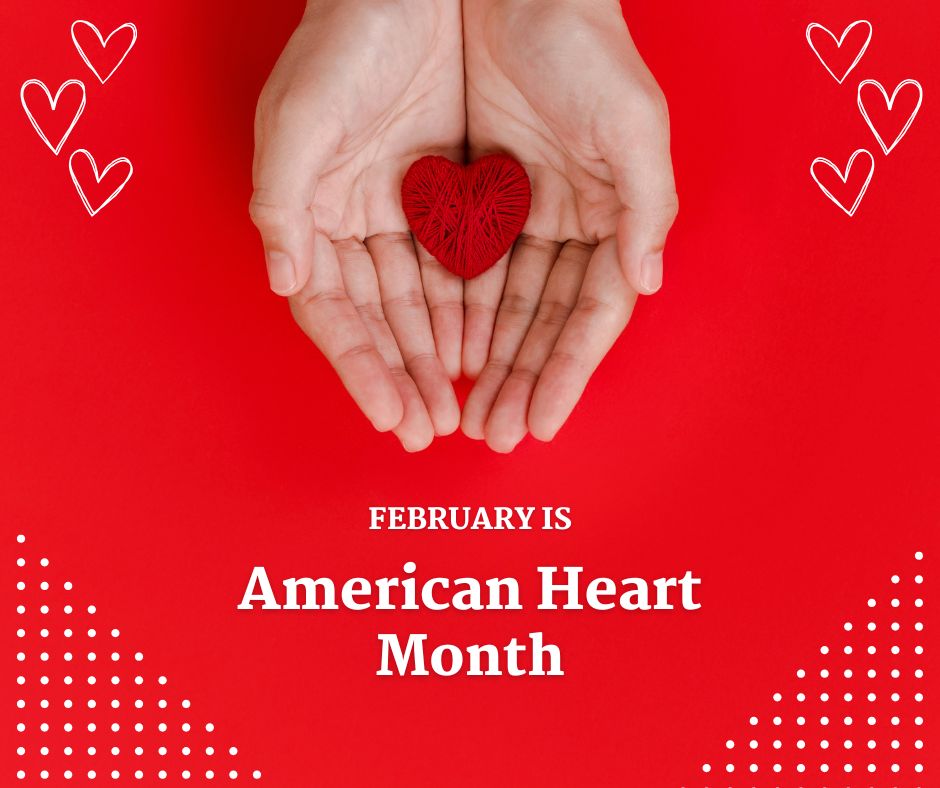 hands holding a small red heart crafted from yarn on a red background